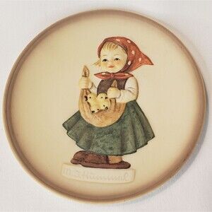 M.J. Hummel "Little Homemaker" plate with stand